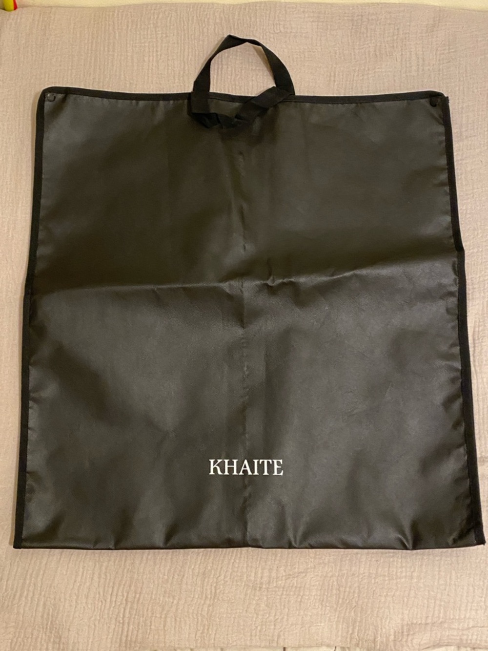 KHAITE Black Garment Travel Bag with Top Handle